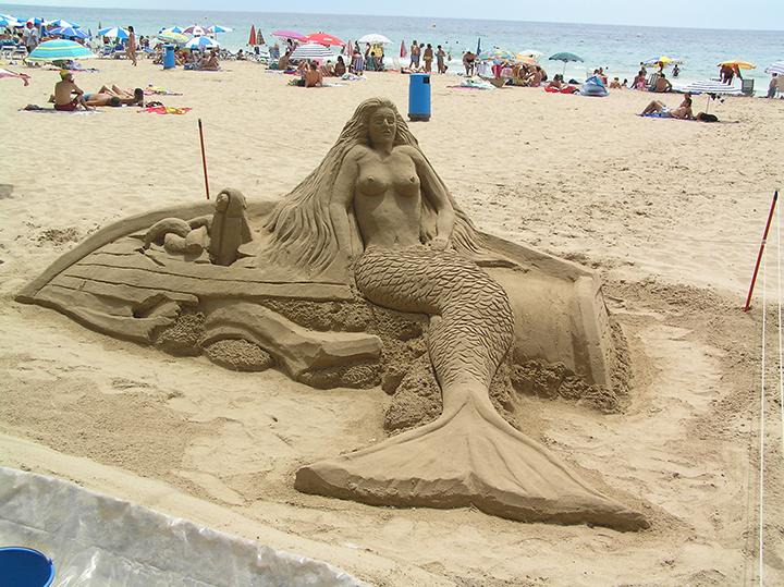Naked woman sandcastle police apologise for 'bad taste' sculpture