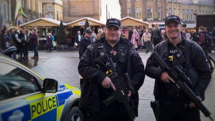 Northumbria police criticised over 'smiling' armed officers