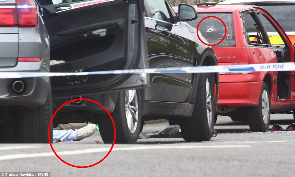 Driver dies after being 'shot 10 times by police and dragged from his vehicle' when armed officers chased him down the M5 motorway
